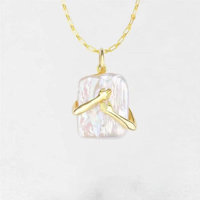 Love Embrace Necklace — sometimes all we need is a hug pendant